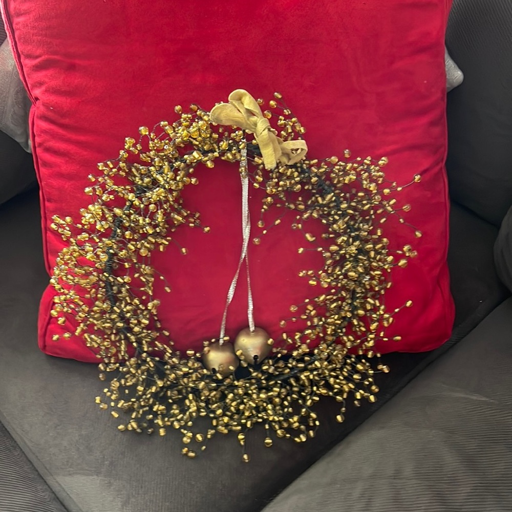 Gold bead wreath on metal frame. Diameter frame 10.5 inches. Beads stretch to 15